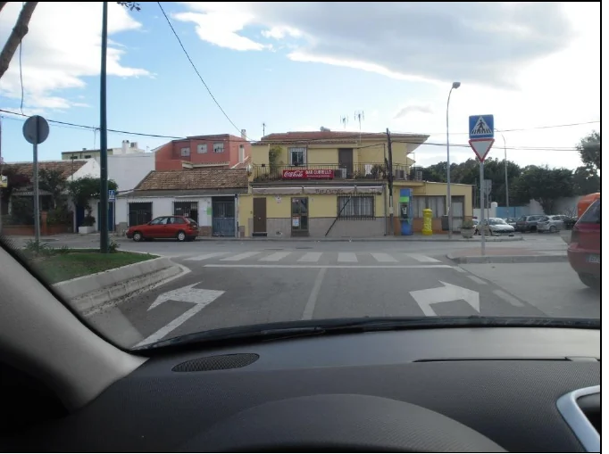 Paso 16: Suba hasta el final de la calle